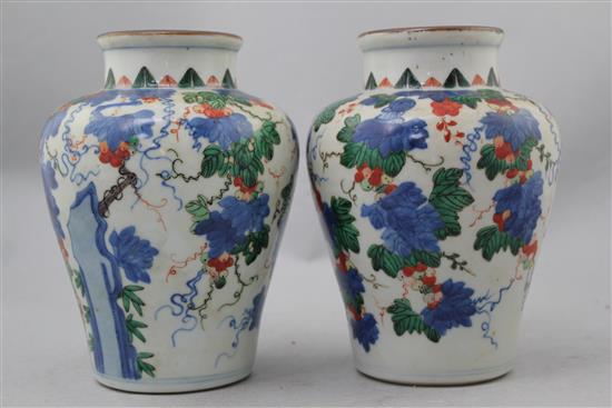 Two wucai jars, a Jizhou paper-cut bowl and a blue and white jar and cover, Song to late Qing dynasty,